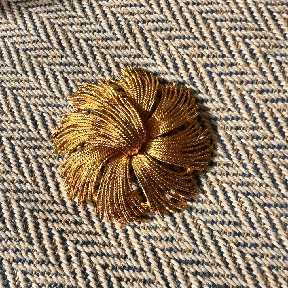 Vintage Monet pin from 1960’s with some patina on the metal - lovely for…